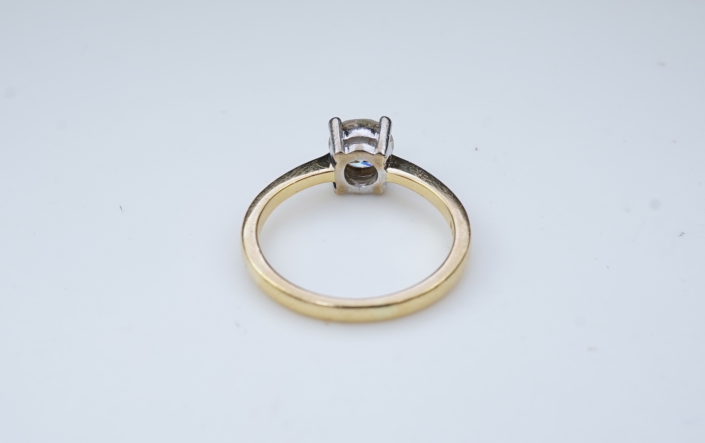 A diamond solitaire ring